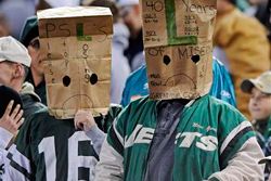 Some loyal Jets fans pose for a picture